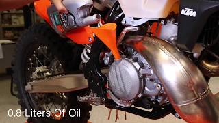 KTM TwoStroke Oil Change  Cycle News [upl. by Htidirem]