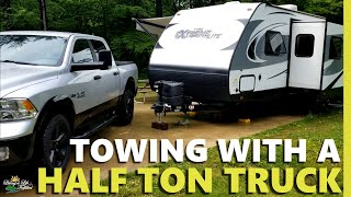 Towing with a half ton truck  safely  My RAM 1500 Outdoorsman [upl. by Lennad]